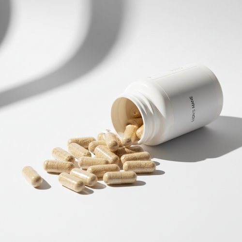 Lion's Mane capsules spilling from bottle